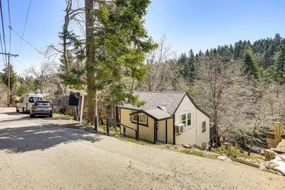 a small house on the side of a road at Tiny Home with Deck and Mtn Views in Lake Arrowhead! in Lake Arrowhead