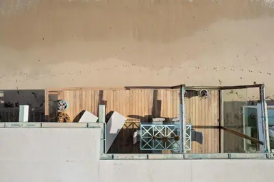 a building that is being remodeled with at Malibu Cove Colony Beach by Stay Awhile Villas in Malibu