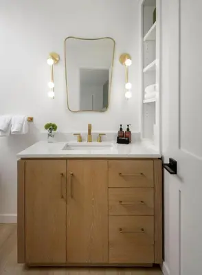 a bathroom with a sink and a mirror at Outdoor Spaces and Coastal Sanctuary in Summerland
