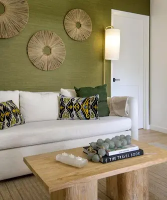 a living room with a white couch and a coffee table at Outdoor Spaces and Coastal Sanctuary in Summerland
