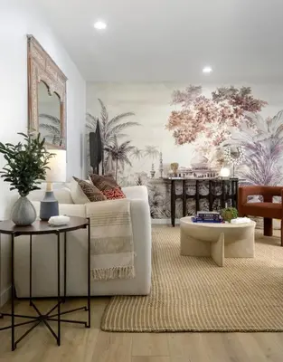 a living room with a white couch and a table at Private Garden and Tranquil Haven in Summerland