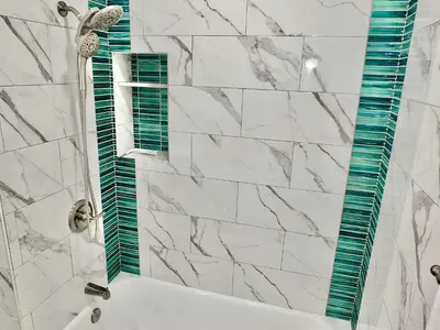 a bathroom with a white tub and a green ruler on the wall at Greenbelt Guesthouse - Unlimited Peace & Privacy Golf Bowling Green & More in Long Beach