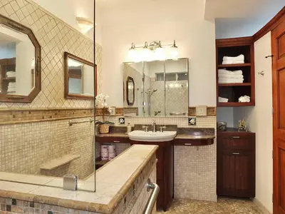a bathroom with a sink and a mirror at The Belmont Beach Bungalow - Pool & Hot tub in Long Beach