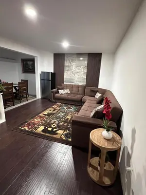 a living room with a couch and a table at Cozy 2 BR Apartment Glendale in Glendale