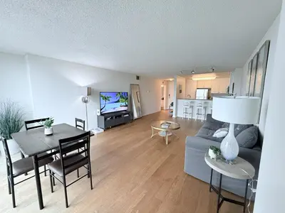 a living room with a couch and a table at Luxury Meets Sea of Dreams in Los Angeles