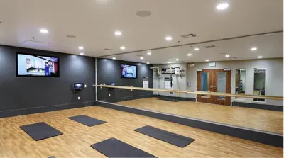 a dance floor with yoga mats in a room at Ocean Views - Rooftop Pool 2BR Santa Monica in Los Angeles