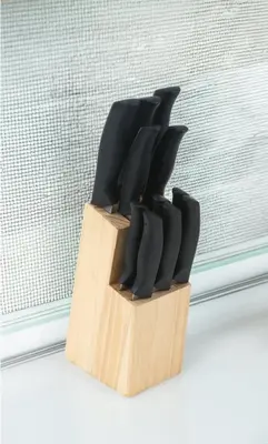 a wooden knife block with black knives in it at Redondo Huge 1Bedroom,3 Queens, close to Beach Sleeps 7 in Redondo Beach