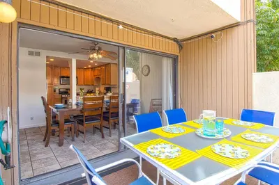 a dining room with a table and chairs at Tron by Funtierland Vacation Rentals in Anaheim