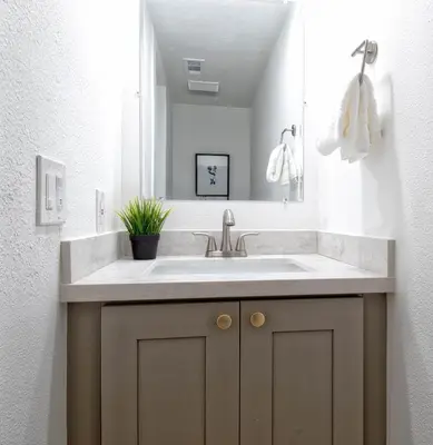 a bathroom with a sink and a mirror at New Suite Escapes 5 by Funtierland Vacation Rentals in Anaheim