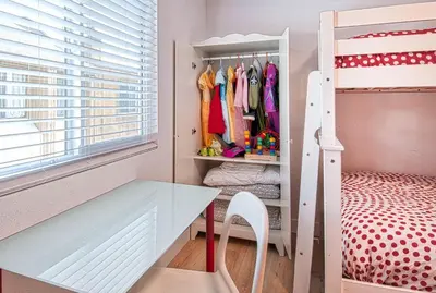 a childs room with a desk and a bunk bed at New Suite Escapes 6 by Funtierland Vacation Rentals in Anaheim