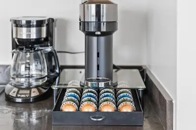 a box of muffins sitting on top of a counter at Rooftop Pool Modern 2BR, 2BA - Panoramic Hollywood views in Los Angeles