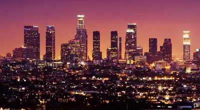 a view of a city skyline at night at Spacious and Bright West Hollywood Pool & Gym in Los Angeles