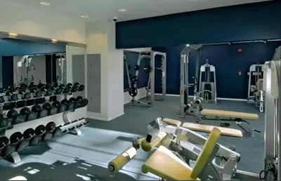 a gym with several treadmills and machines at Oceanfront Bliss, Beach & Marina Views, Roomy 1BR in Los Angeles