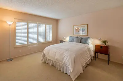 a bedroom with a bed and a window at Keys Retreat by Paradise Retreats in Ventura