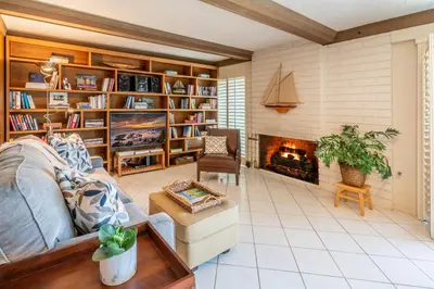 a living room with a couch and a fireplace at Keys Retreat by Paradise Retreats in Ventura
