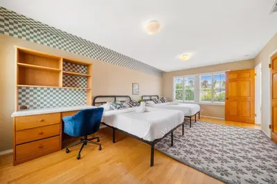 a room with three beds and a desk at Beverly Hills 6BR Haven w Pool Hot Tub in Los Angeles
