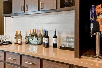 a bunch of bottles of wine sitting on a counter at Homewood Suites by Hilton Anaheim Conv Ctr/Disneyland Main in Anaheim