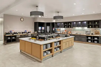 a large kitchen with a large island in the middle at Homewood Suites by Hilton Anaheim Conv Ctr/Disneyland Main in Anaheim