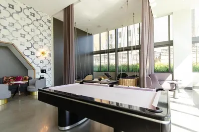 a large billiard room with a pool table at Beautiful 3 Bedroom High Rise with Pool, Hot Tub and Rooftop Views in Los Angeles