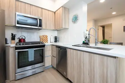 a kitchen with a stove and a sink at Walk to Santa Monica Beach, Pier, Boardwalk and Venice in Los Angeles