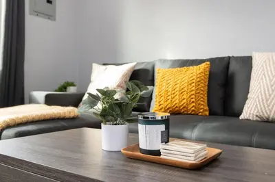 a coffee table in a living room with a couch at Spacious 3 Bedroom 2 Bathroom Apartment with Free Onsite Parking in Los Angeles