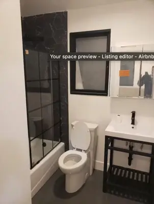 a bathroom with a toilet and a sink at Venice Beach Boho - 2 apartments in Los Angeles