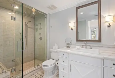 a bathroom with a shower and a toilet and a sink at Seacliff Beach Retreat - Amazing Beachfront for Family of 6 in Ventura