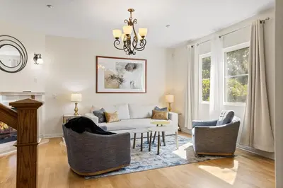 a living room with a white couch and chairs at Modern townhouse - 4 Bedroom 3Bathroom near Pasadena, LA in Duarte