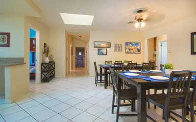 a dining room with a table and chairs at F-13 California Dreamin in Anaheim