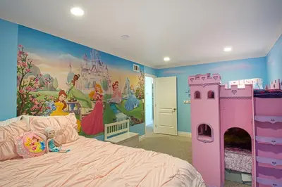 a childs bedroom with a castle mural on the wall at F-16 Pirates Lair in Anaheim