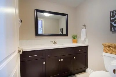 a bathroom with a sink and a mirror at F-16 Pirates Lair in Anaheim