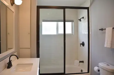 a bathroom with a shower and a sink at F-39 Helena in Anaheim