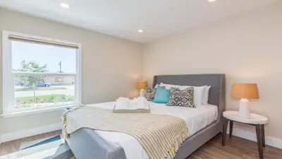 a bedroom with a bed and a window at F-52 Trenton II in Anaheim