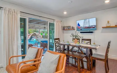 a dining room with a table and chairs at F-59 Goodhue in Anaheim