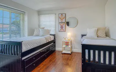 a bedroom with two beds and a window at F-59 Goodhue in Anaheim