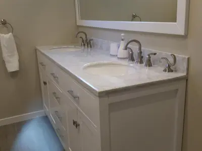 a bathroom with two sinks and a mirror at F-60 Disney Dream Craftsman in Anaheim