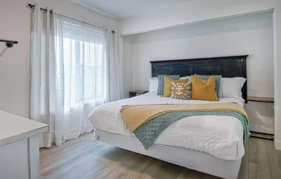 a bedroom with a large bed and a window at F-64 California Vibes in Anaheim