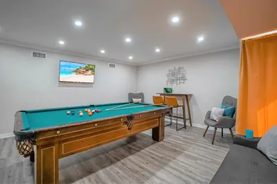 a billiard room with a pool table in it at F-65 Adventure House in Anaheim