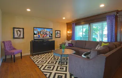a living room with a couch and a table at F-15 Haunted Mansion in Anaheim