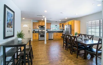 a kitchen and dining room with a table and chairs at F-22 Castle House 2 in Anaheim