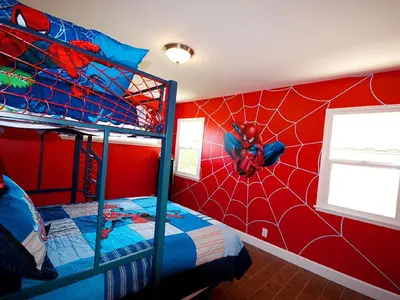 a bedroom with two bunk beds and a spiderman wall at F-34 Minnies House in Anaheim