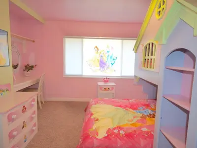 a pink bedroom with a bed and a window at F-26 Andys House in Anaheim