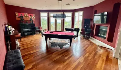a living room with a pool table and a piano at Room with a view in the Hills of Studio City -B in Studio City