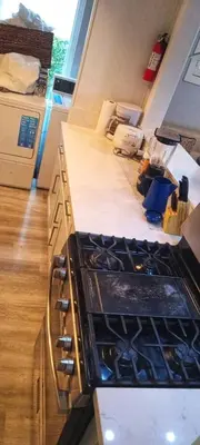 a kitchen with a stove and a counter top at Hollywood Homes of Love in Los Angeles