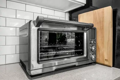 a toaster oven sitting on a counter in a kitchen at Walgrove Guest House in Los Angeles