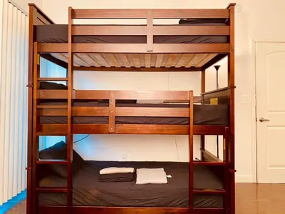 a bunk bed in a room with a bunk bed in a room at Riverton Place NoHo in Los Angeles