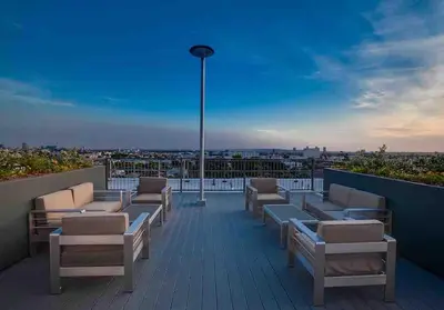 a balcony with chairs and a view of a city at Penthouse 2 Bedroom with Hollywood Sign View! in Los Angeles