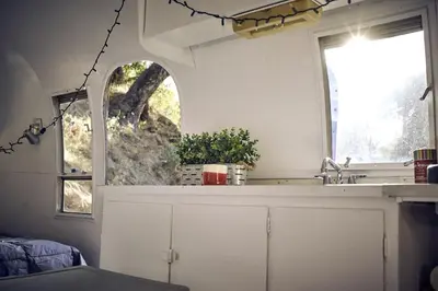 a kitchen with a sink and a window at Secluded Pet Friendly Airstream in Calabasas, California in Calabasas