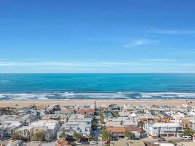 an aerial view of a beach with houses and the ocean at Manhattan Beach Guest Suite in Manhattan Beach