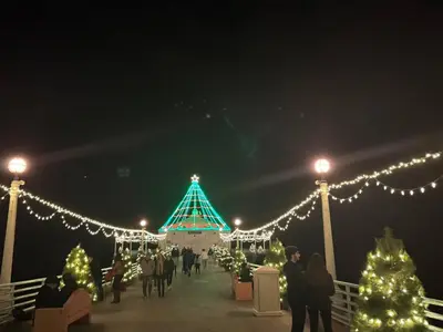 a christmas market with lights and christmas trees at Manhattan Beach Guest Suite in Manhattan Beach